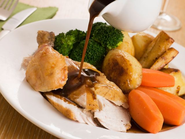 Roast chicken dinner with gravy Roast chicken dinner with gravy